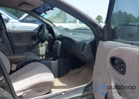 1999 Saturn Sw2 from USA, damaged, VIN 1G8ZK8270XZ189484